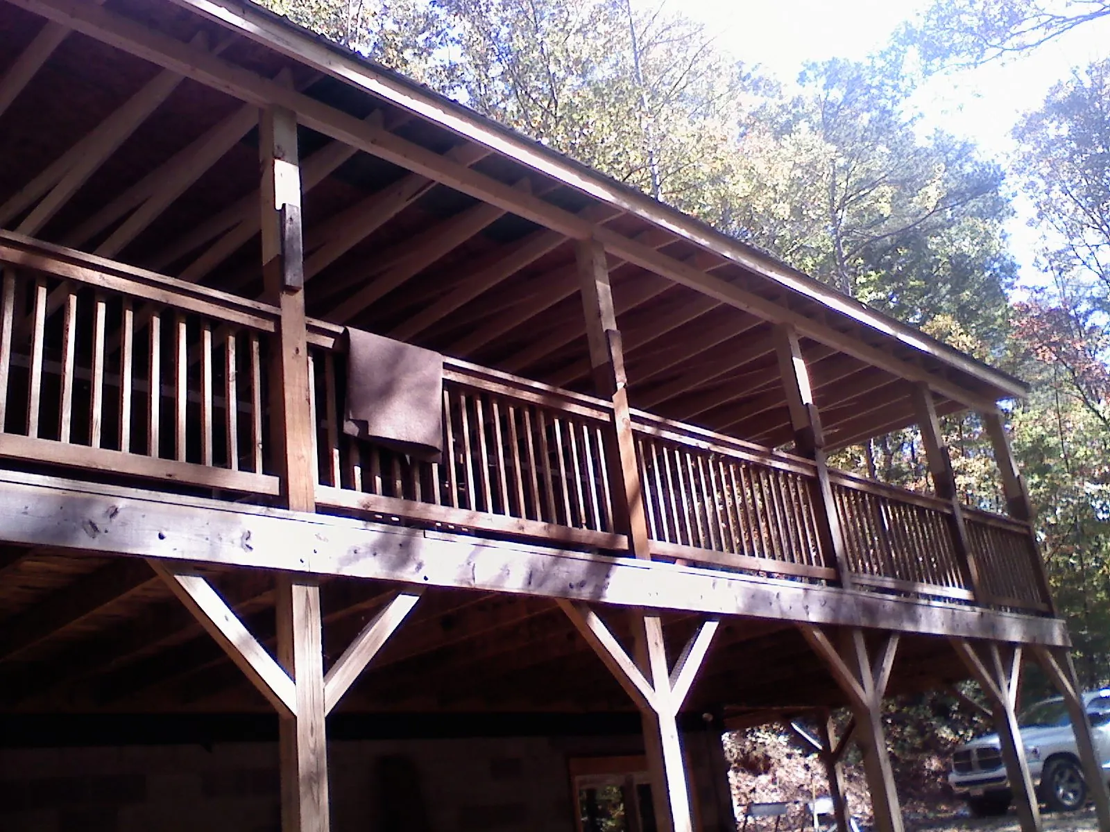Timber framing under a new elevated porch and deck — Roof Leak Repair in Haswell by Roofing Brothers